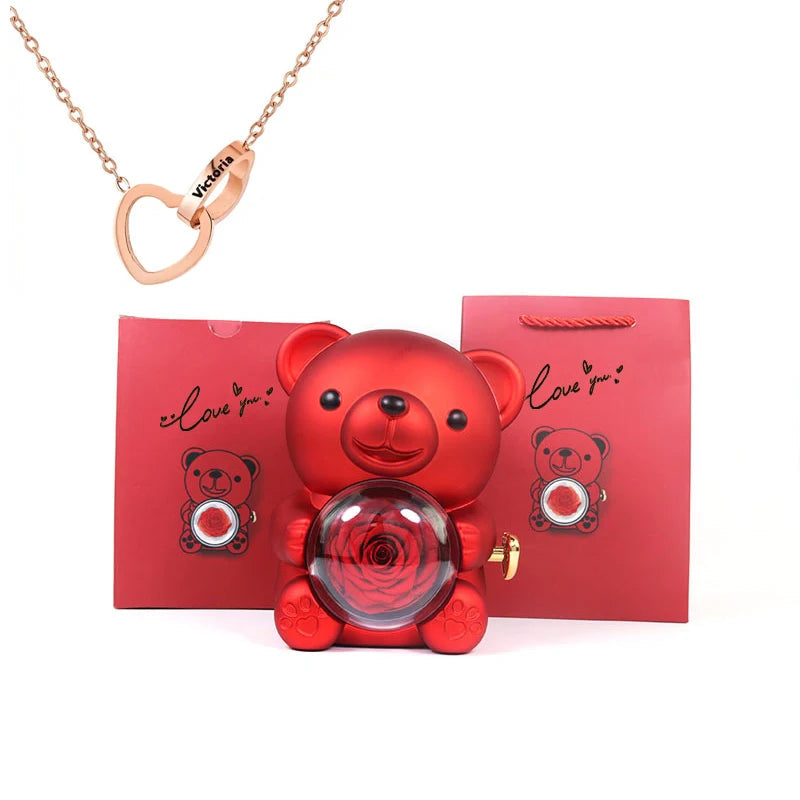 Urso Rotativo com Colar Dois Corações